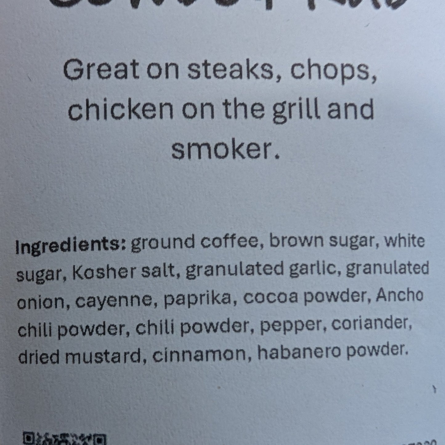 Label for 'Cowboy Rub' seasoning on a brown container