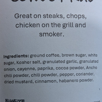 Label for 'Cowboy Rub' seasoning on a brown container