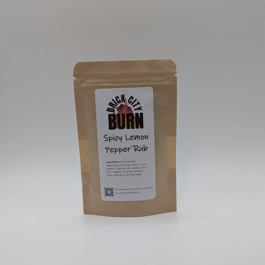 Kraft paper packaging with a label for Brick City Burn Spicy Lemon Pepper Rub on a white background