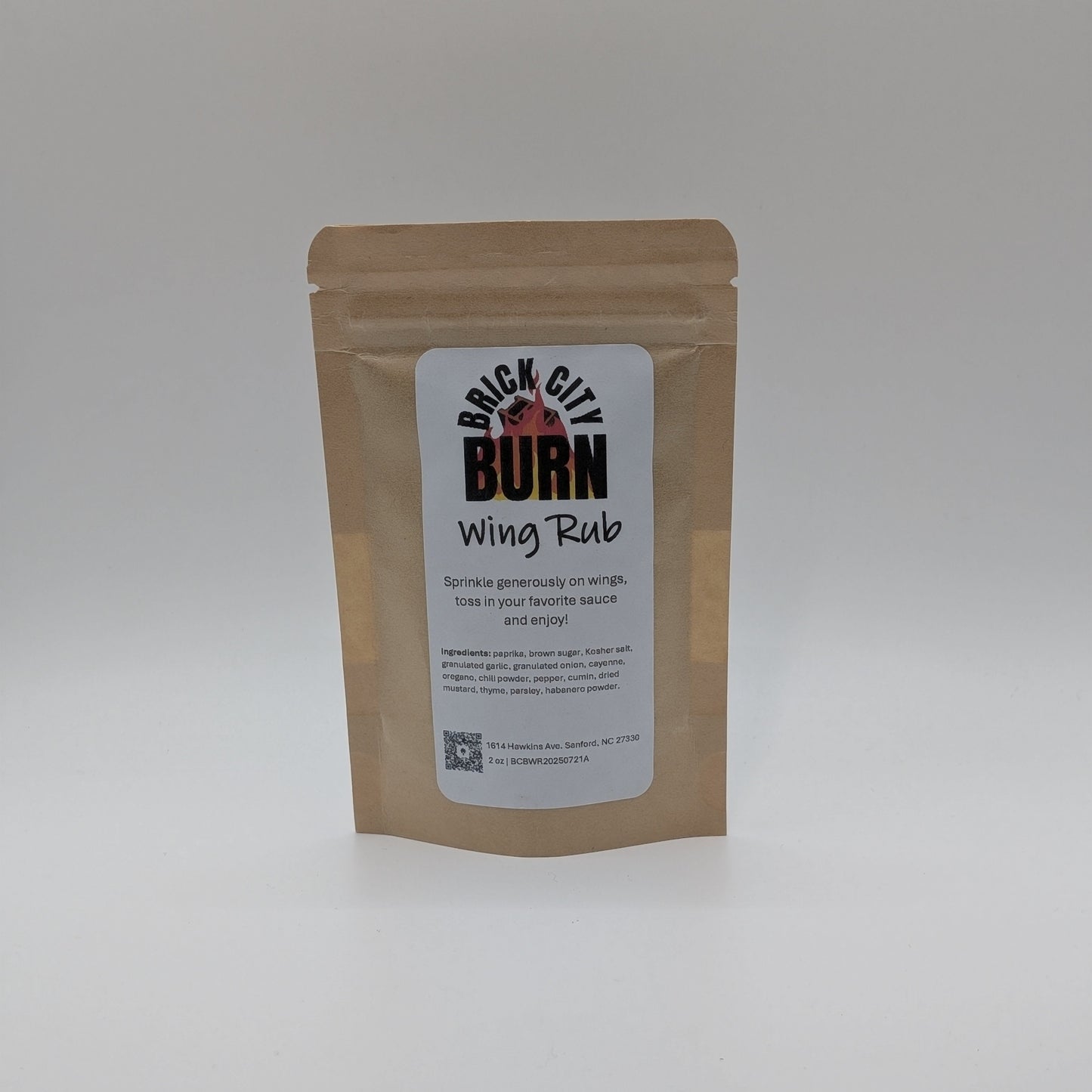 Brown packaging of Brick City Burn Wing Rub on a white background