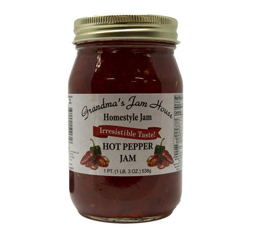 Jar of Grandma's Jam House Hot Pepper Jam on a white background