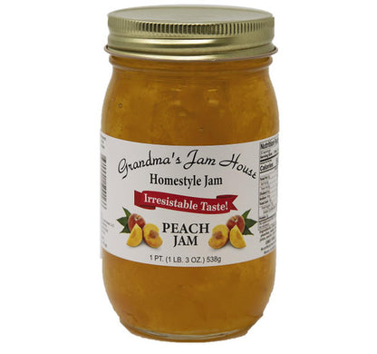 Jar of Grandma's Jam House peach jam on a white background