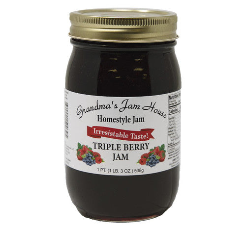 Jar of Grandma's Jam House Triple Berry Jam on a white background